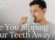 man drinking from coffee cup